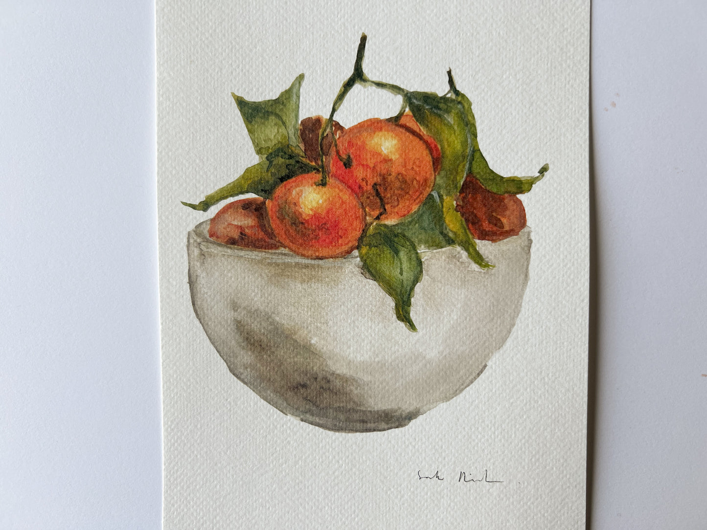 Bowl de cerámica con naranjas