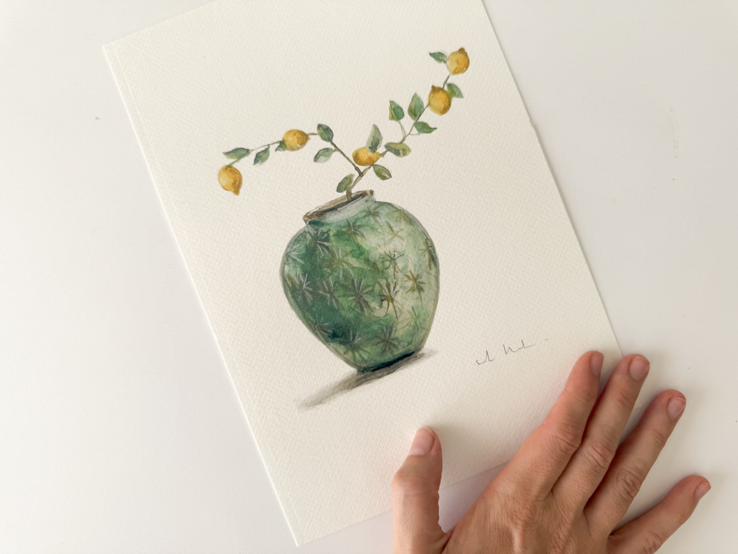 Jarrón con limones amarillos