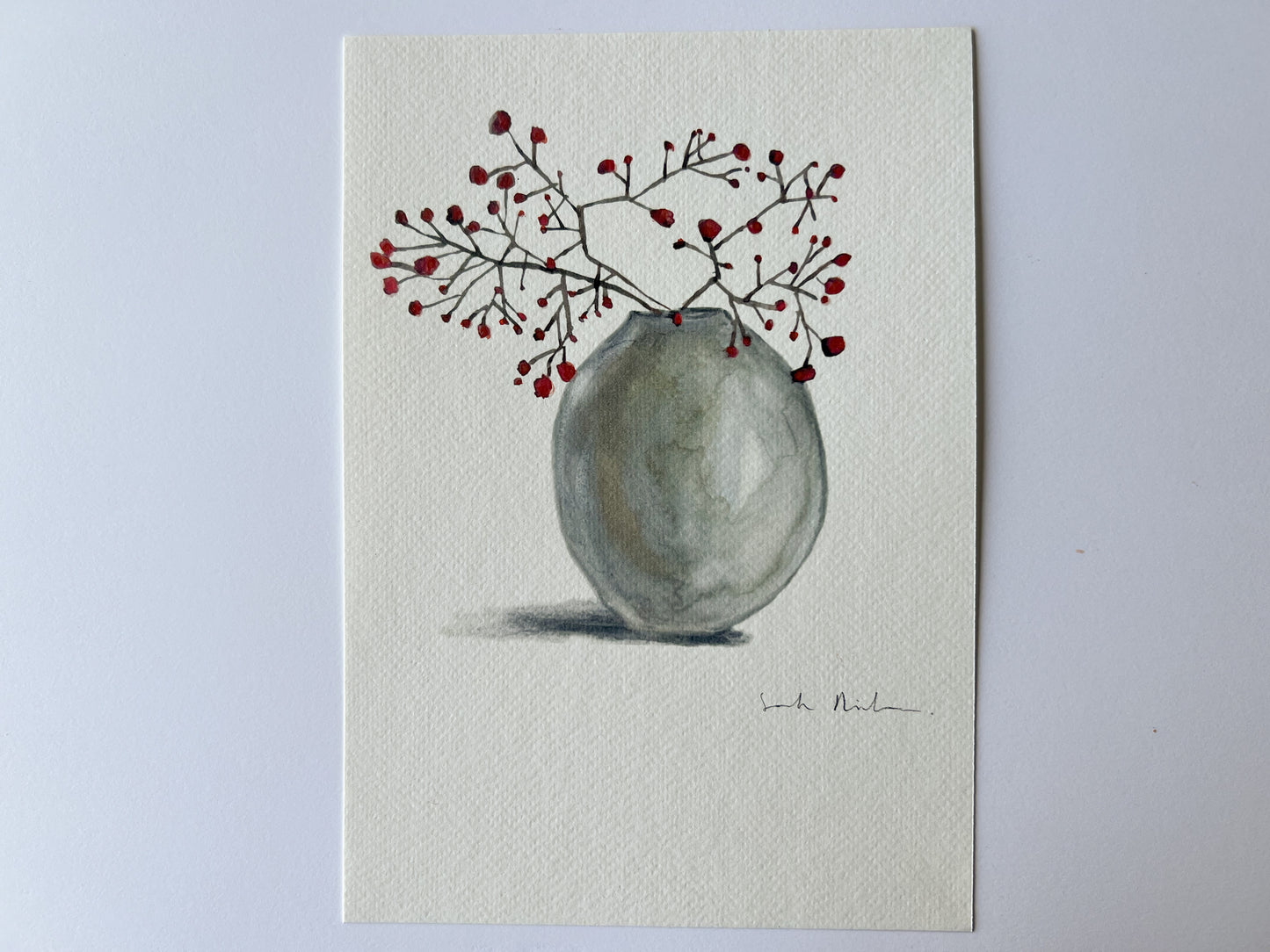 Jarrón con arándanos